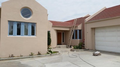 Pacific Sand Colored Stucco House